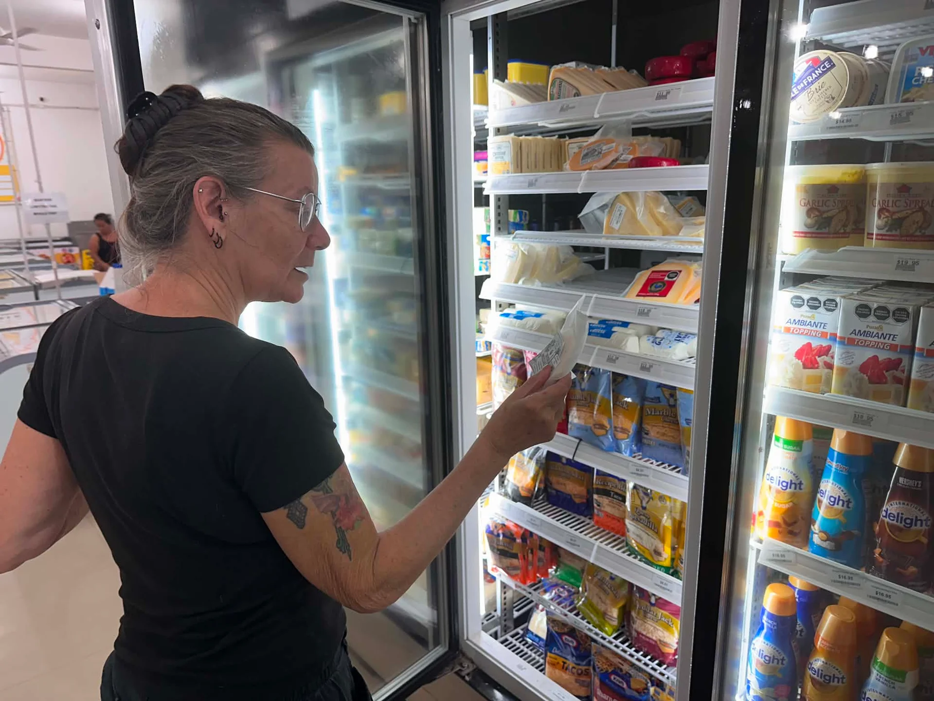 Checking out the very slim pickings in the cheese department