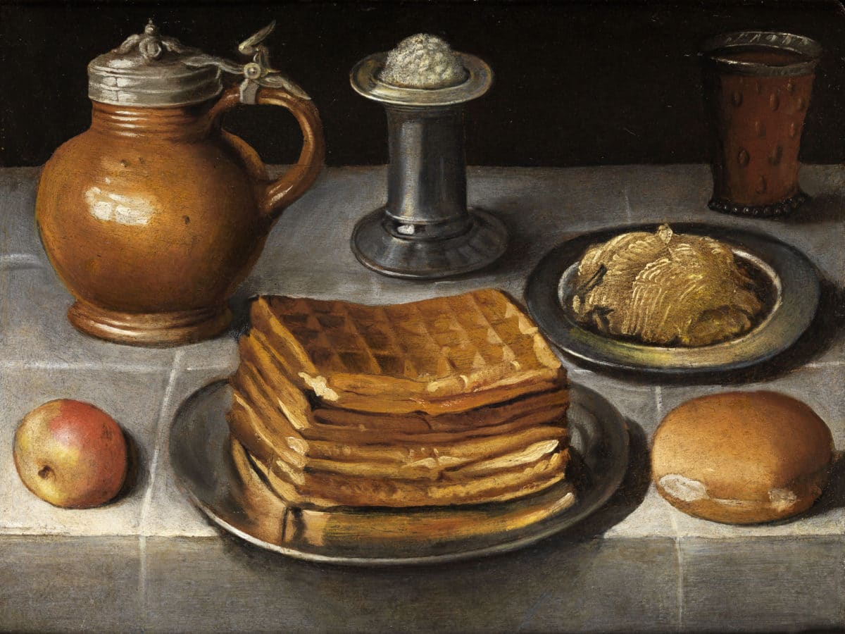 Detailed still life painting featuring a waffle, jug, and other table items.