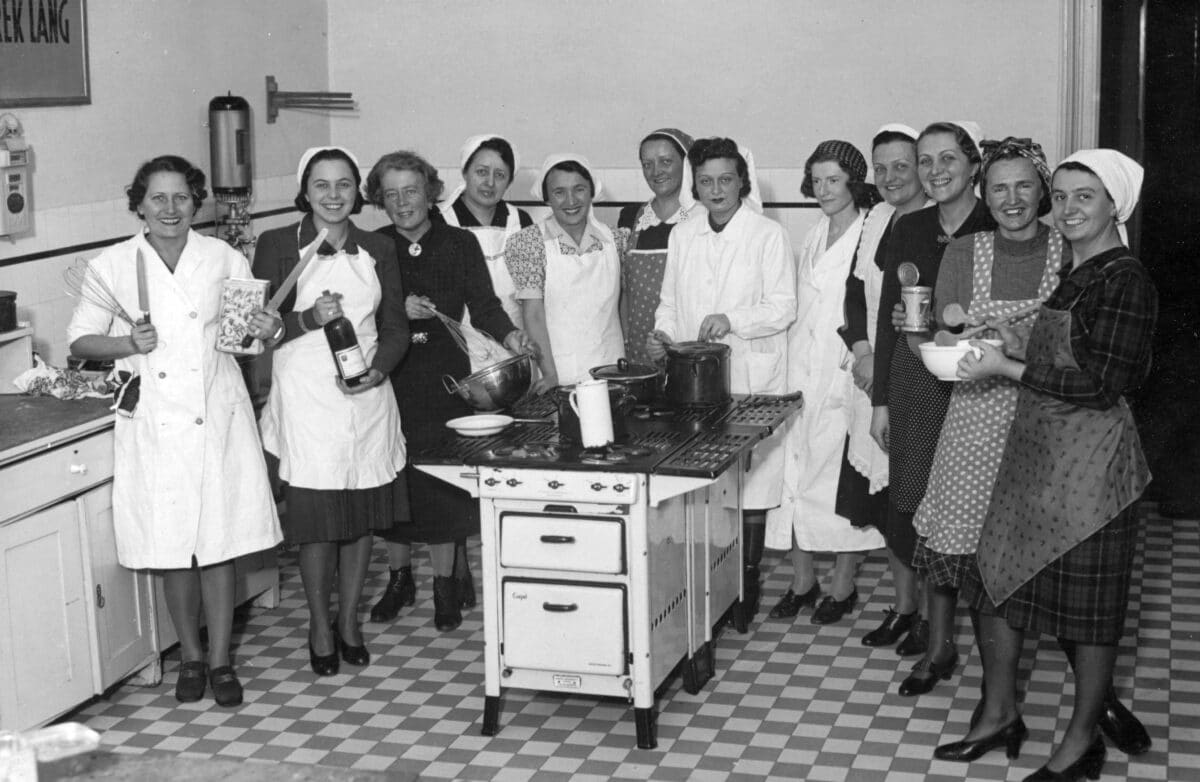 Tableau of women in a kitchen
