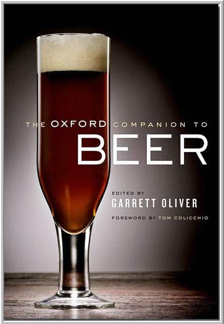 Cover of "The Oxford Companion to Beer" book, showcasing a glass of beer.