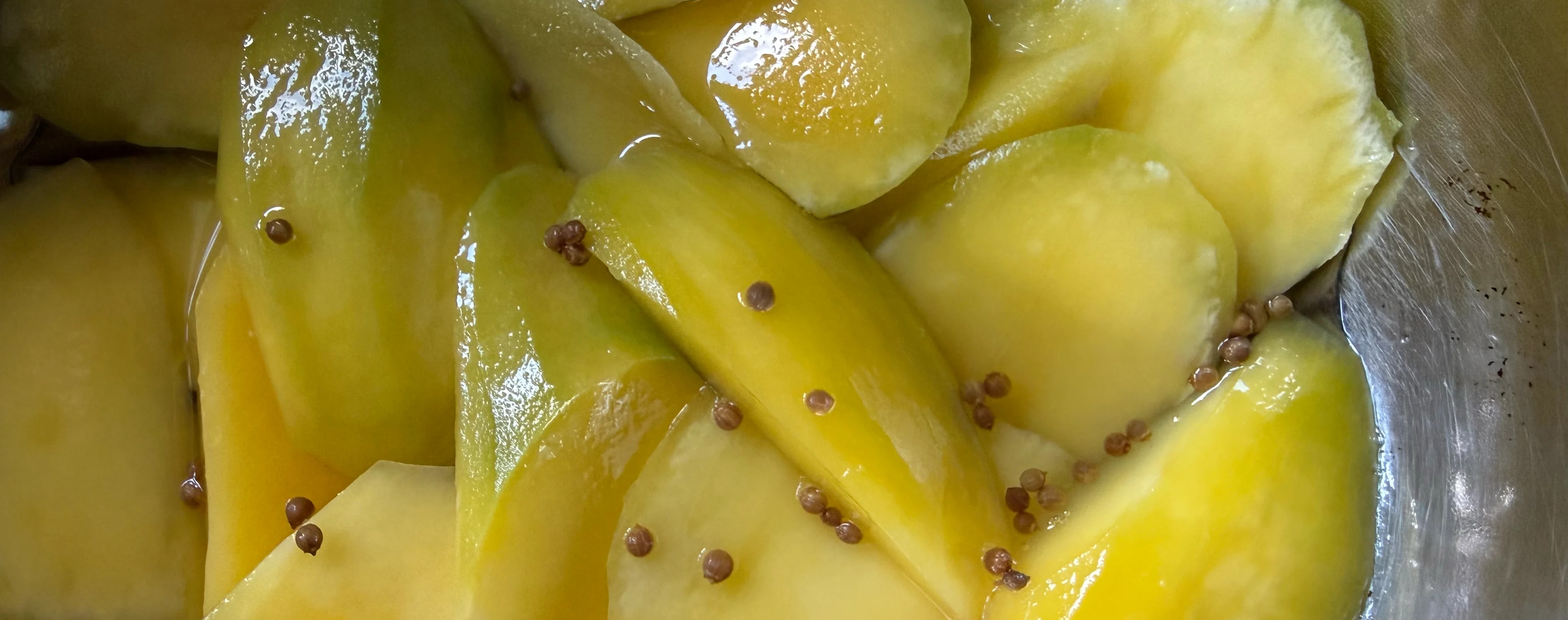 Mangoes and coriander seed after fermenting, and before blending into a sauce