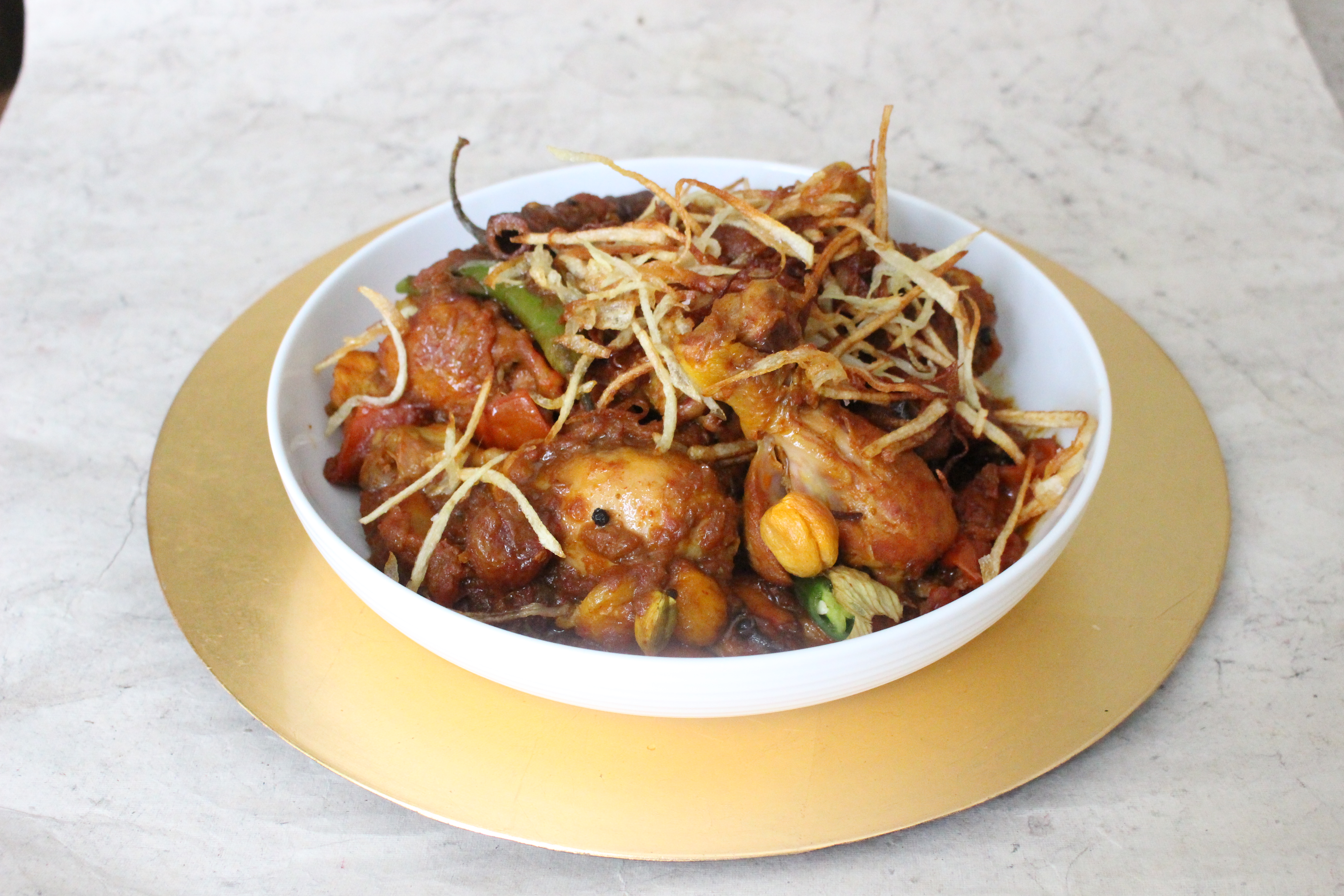 Sali Murghi Jardaloo Sathay (Chicken with Apricots and Potato Straws)