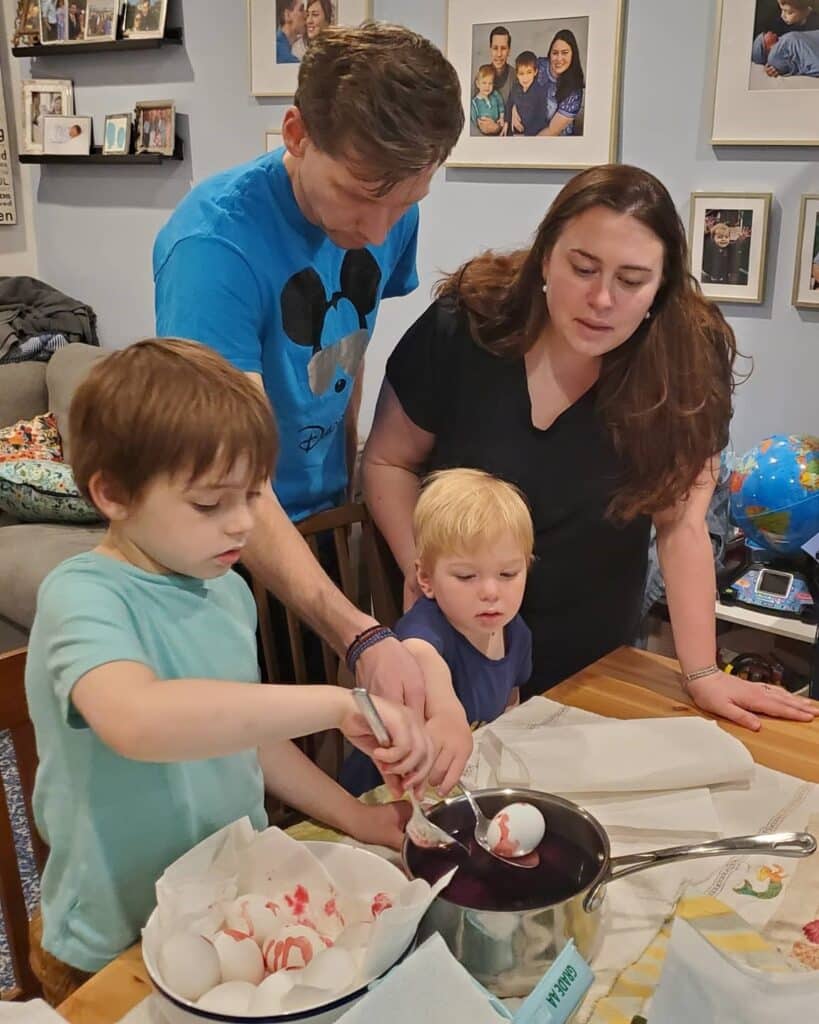 Greek family dying Easter Eggs