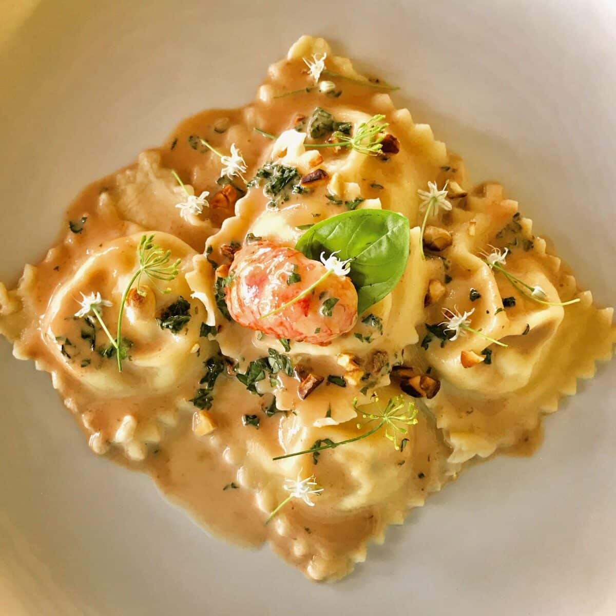 Crayfish Ravioli with Masawa, Lime Basil & Dill Velouté