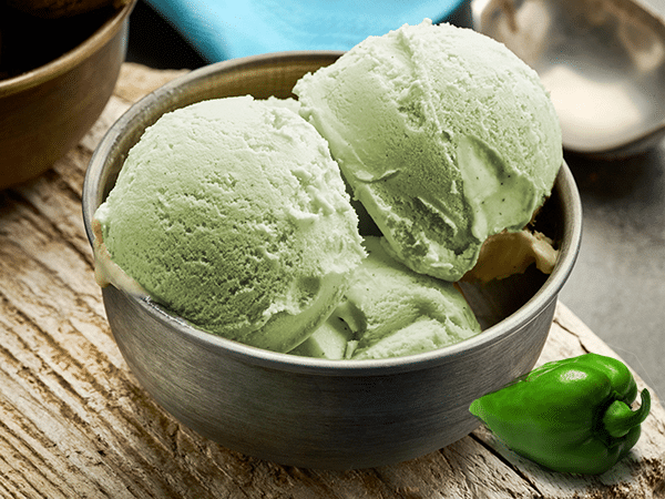 dish of habanero ice cream on a wooden table